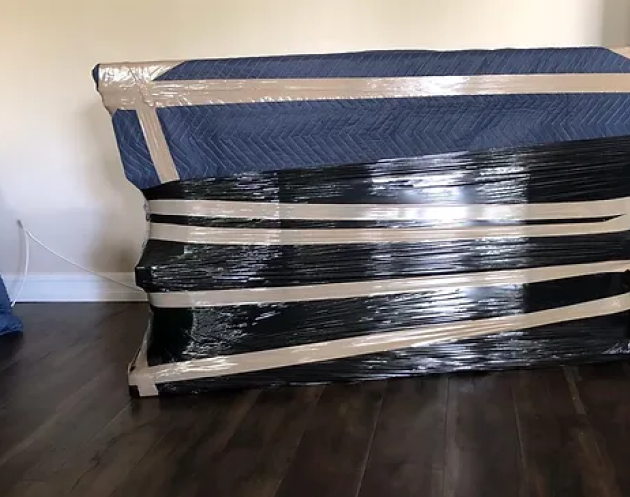 bed covered in plastic