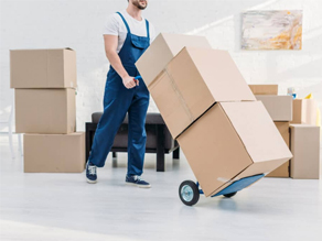 Movers carrying a piece of furniture.